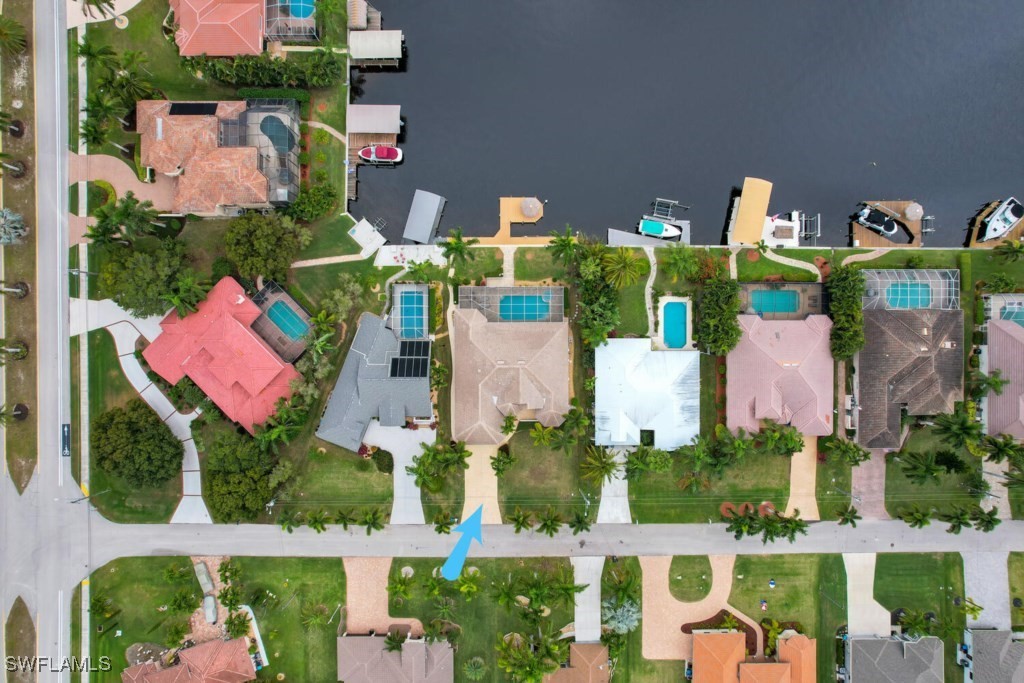 2810 Southwest 49th Terrace Cape Coral, FL 33914 - Photo 27 of 33 an aerial view of houses swimming pool and outdoor space