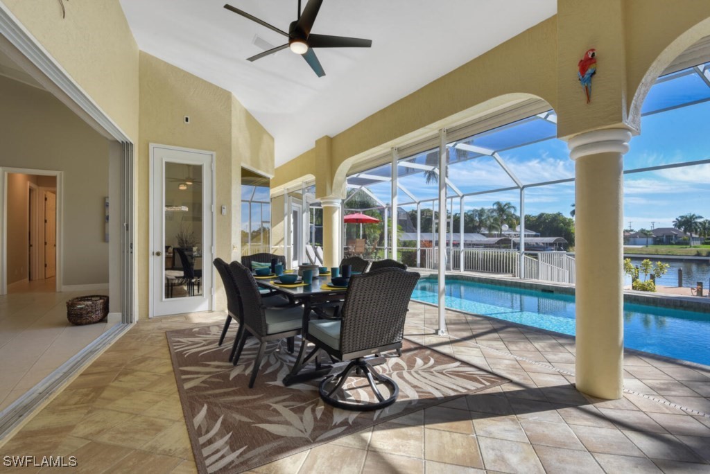 2810 Southwest 49th Terrace Cape Coral, FL 33914 - Photo 31 of 33 a view of a dining room with furniture window and wooden floor