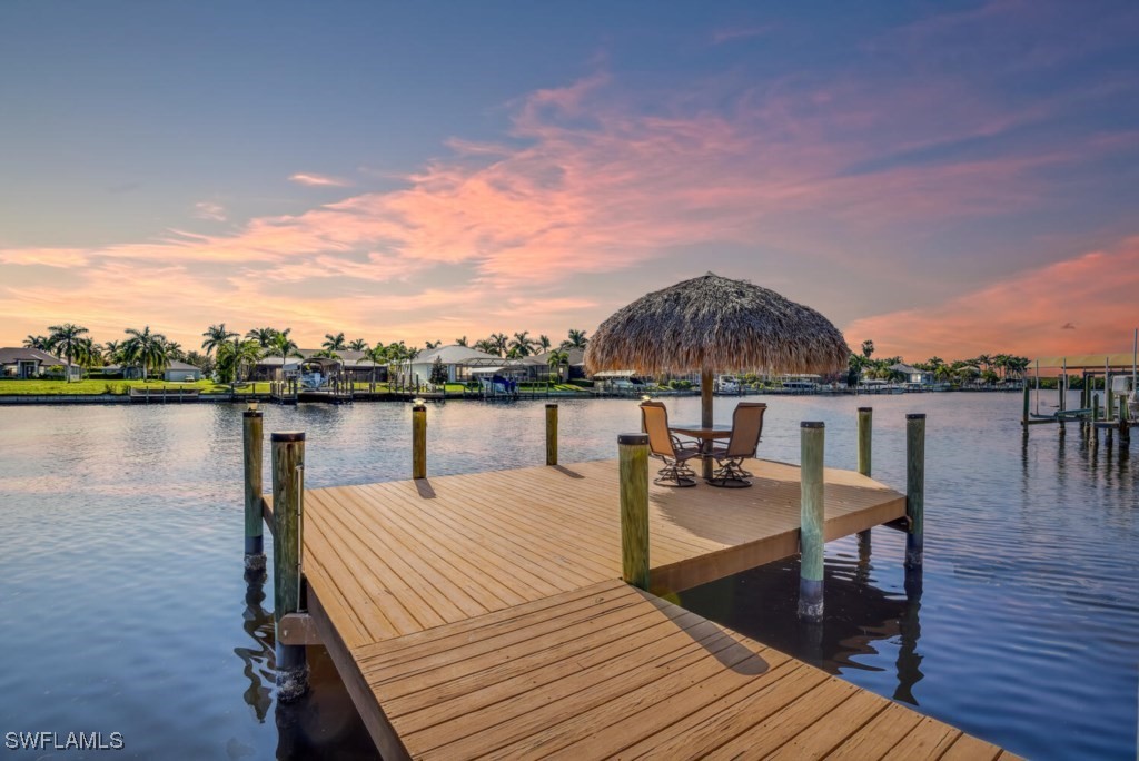 2810 Southwest 49th Terrace Cape Coral, FL 33914 - Photo 9 of 33 a outdoor view with a lake view