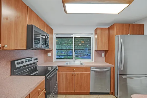 $115,000 | 9351 Lime Bay Boulevard, Unit 201, Tamarac, FL 33321