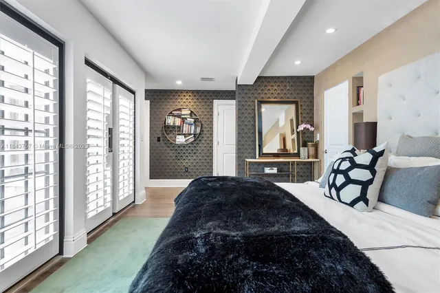 a view of a hallway with windows