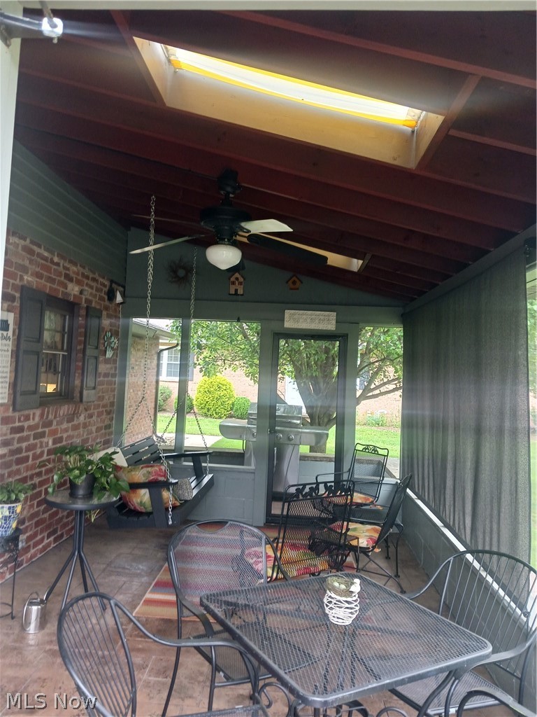 104 Marshall Road Marietta, OH 45750 - Photo 5 of 37 View of back screened in porch with ceiling fan