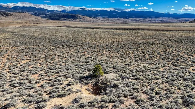 a view of an ocean and a mountain
