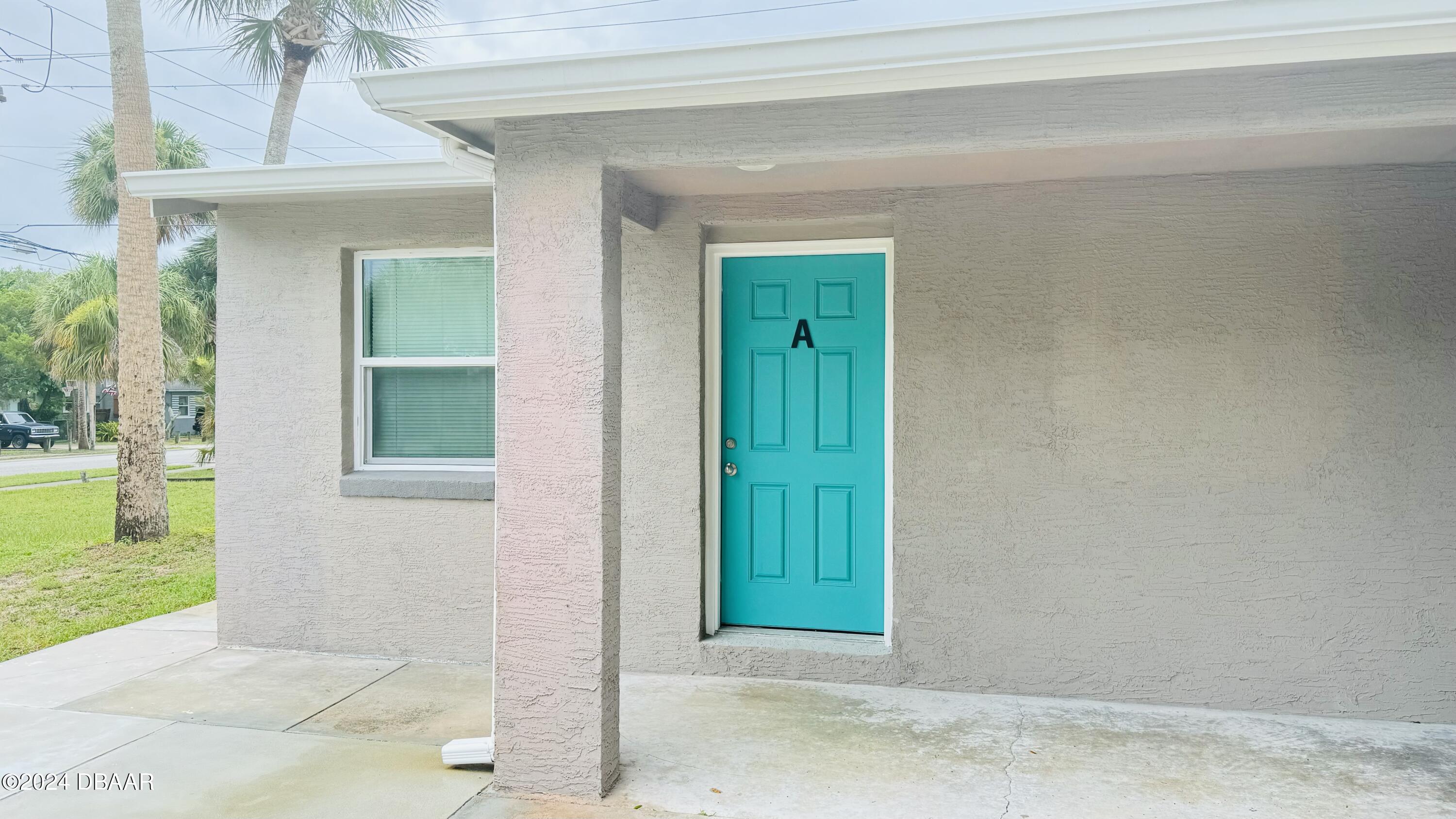 71 Rockefeller Drive, Unit A Ormond Beach, FL 32176 - Photo 6 of 21 IMG_1051