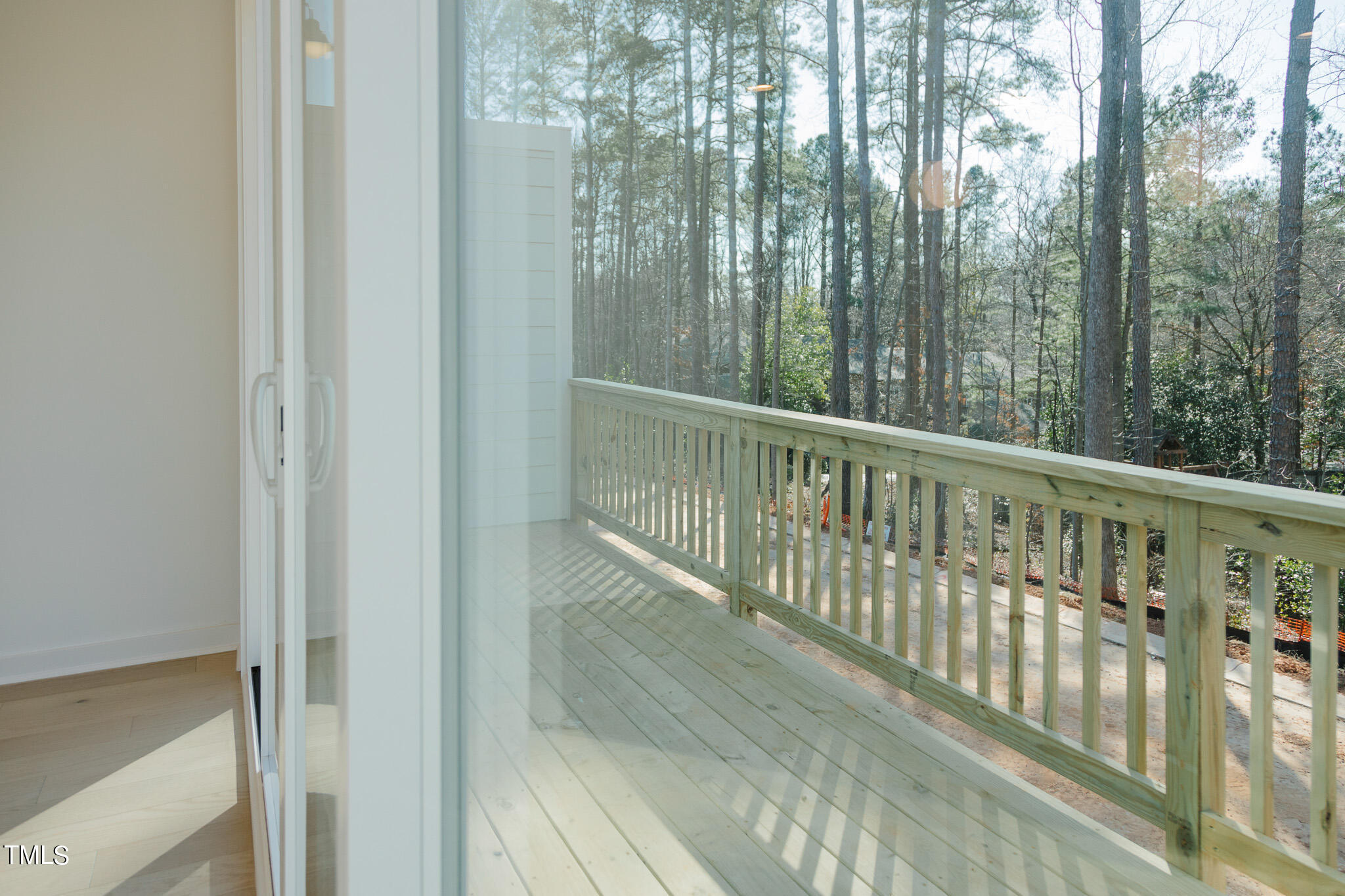 6425 Tanner Oak Lane Raleigh, NC 27613 - Photo 11 of 41 a view of balcony with trees