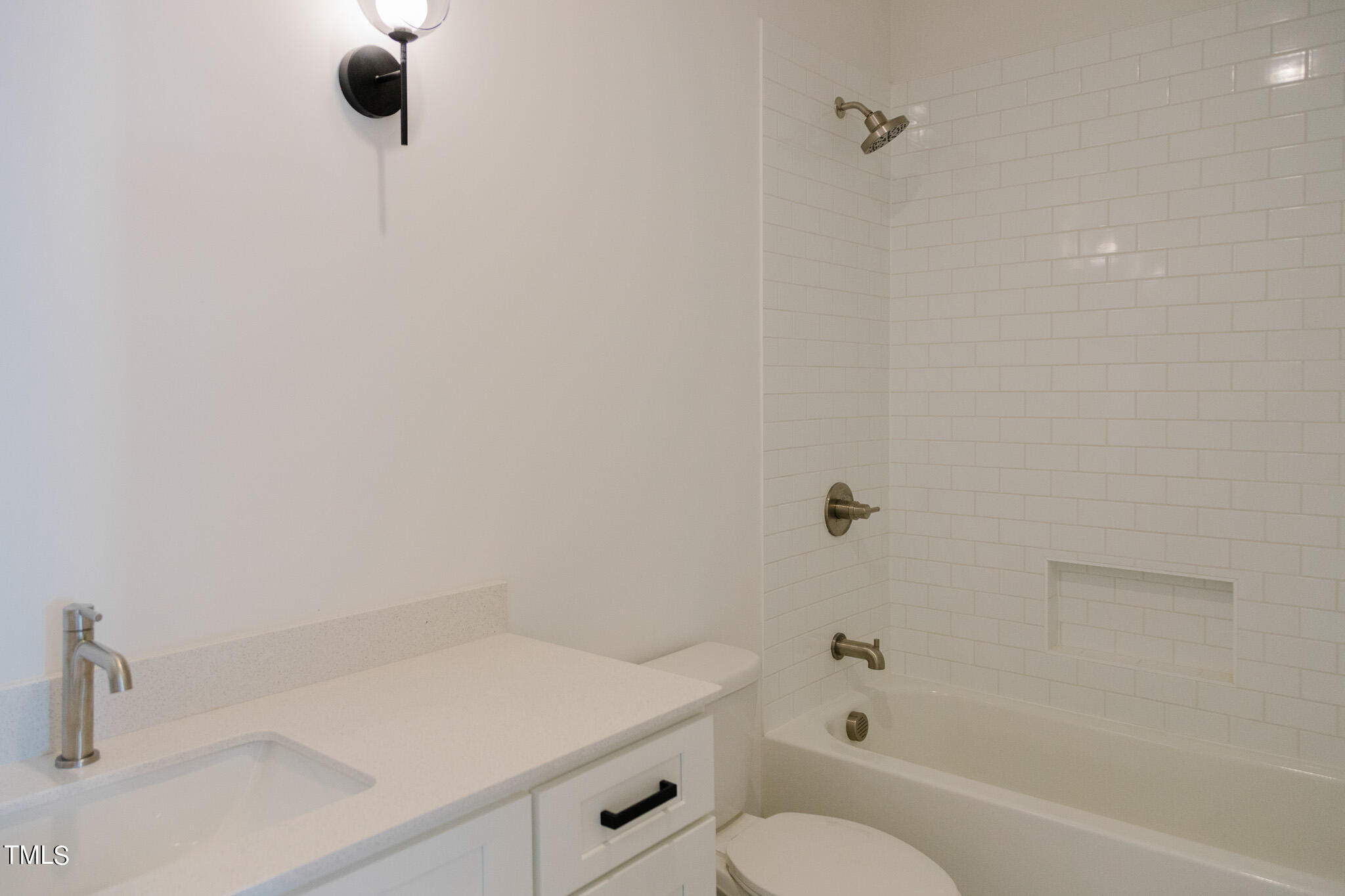 6425 Tanner Oak Lane Raleigh, NC 27613 - Photo 16 of 41 a bathroom with a sink toilet and shower