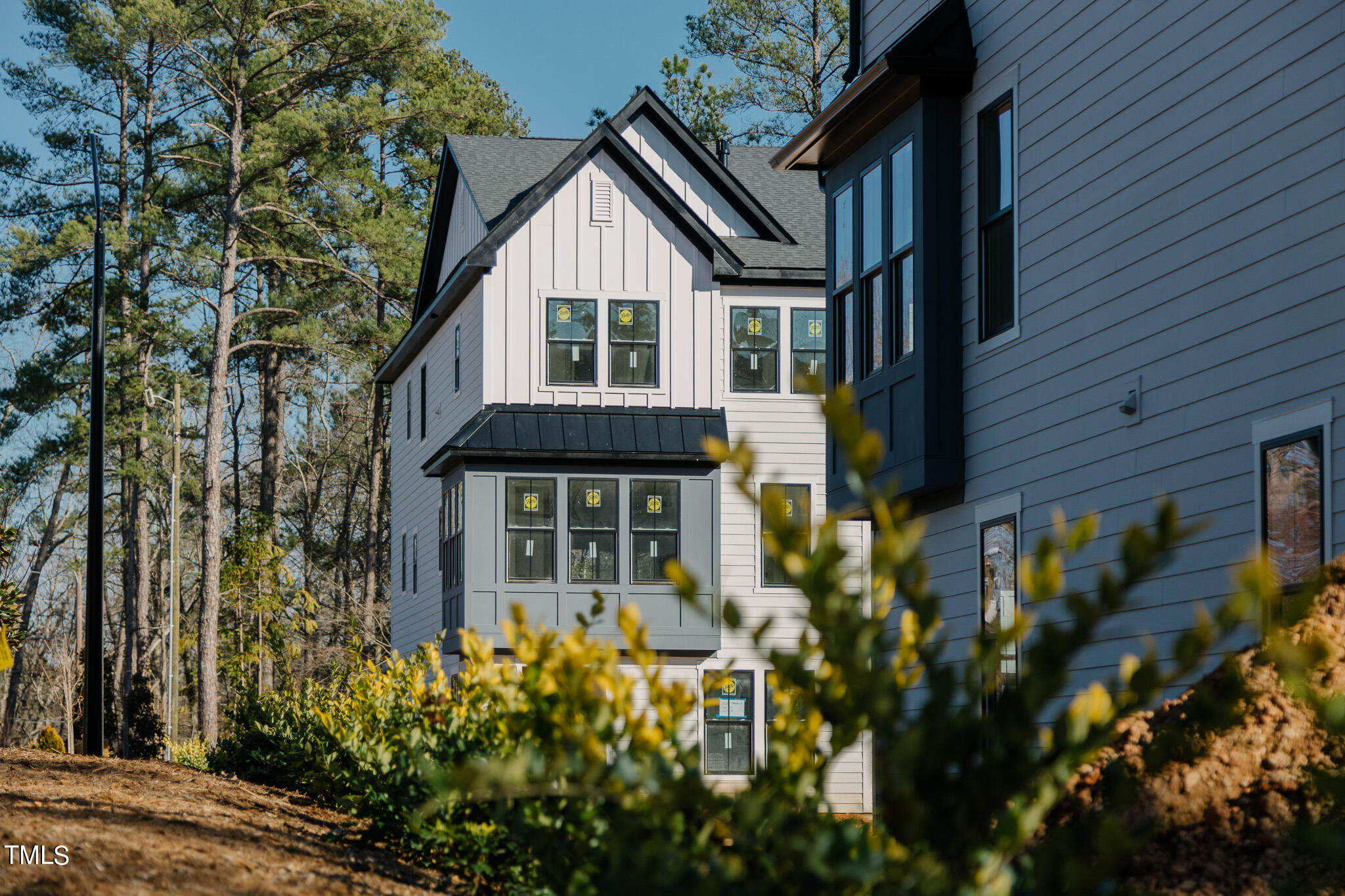 6425 Tanner Oak Lane Raleigh, NC 27613 - Photo 2 of 41 front view of a house with a small yard