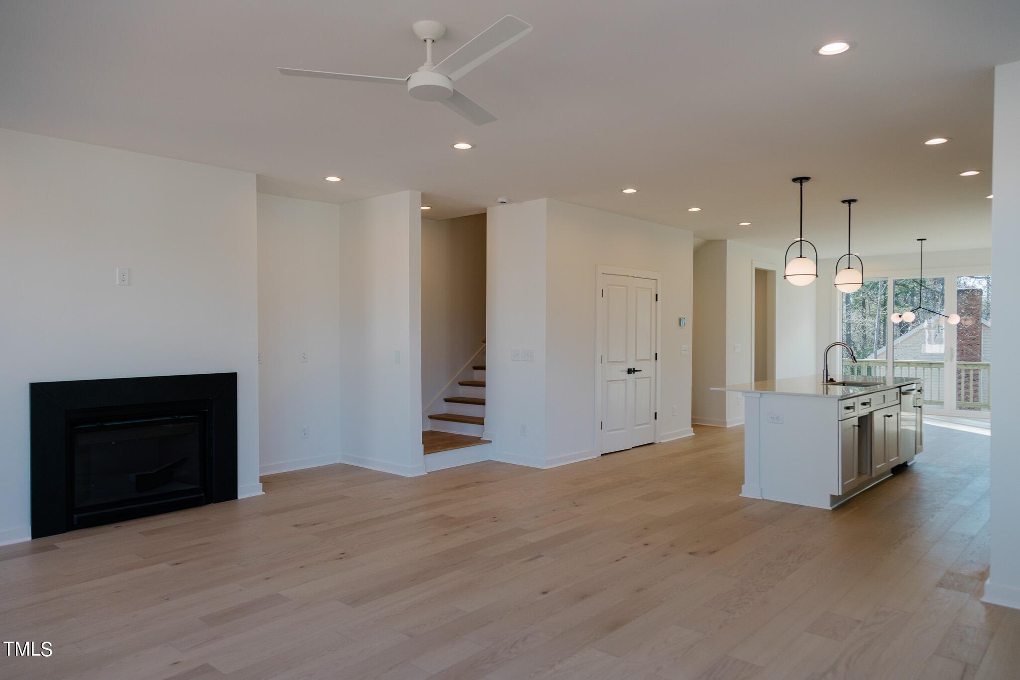 6425 Tanner Oak Lane Raleigh, NC 27613 - Photo 6 of 41 a view of kitchen with refrigerator and window