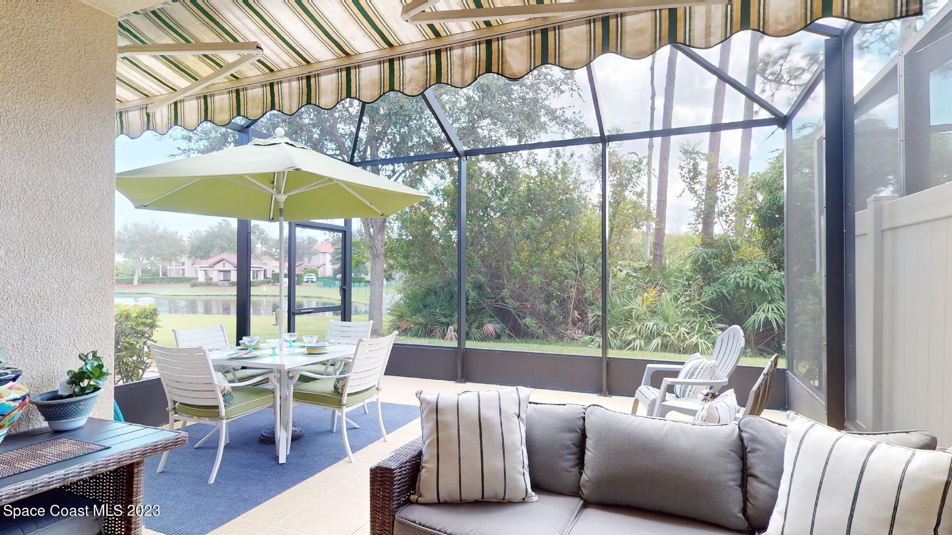 3242 Arden Circle Melbourne, FL 32934 - Photo 25 of 28 a living room with furniture and a window