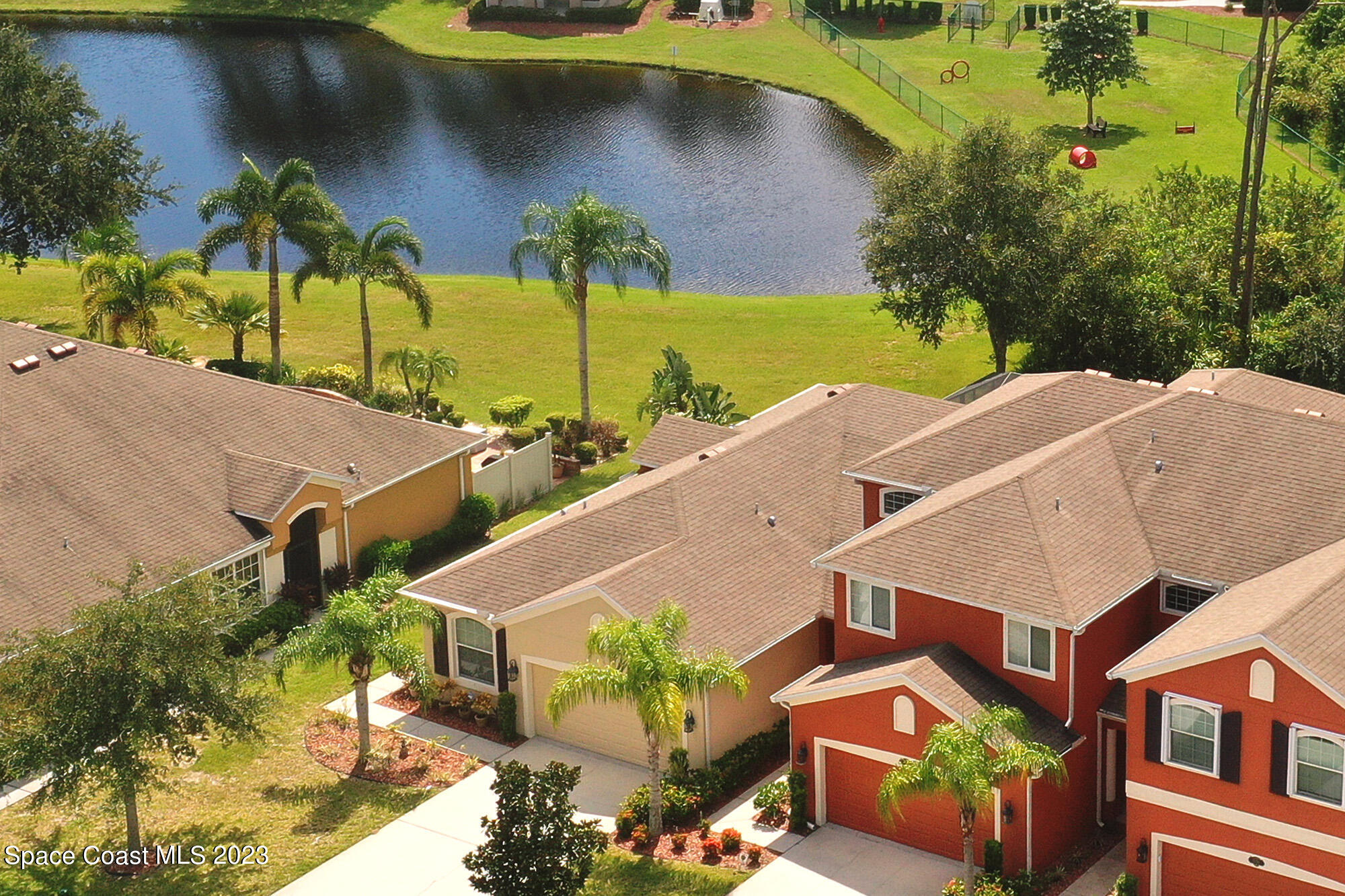3242 Arden Circle Melbourne, FL 32934 - Photo 3 of 28 an aerial view of house with yard swimming pool and outdoor seating