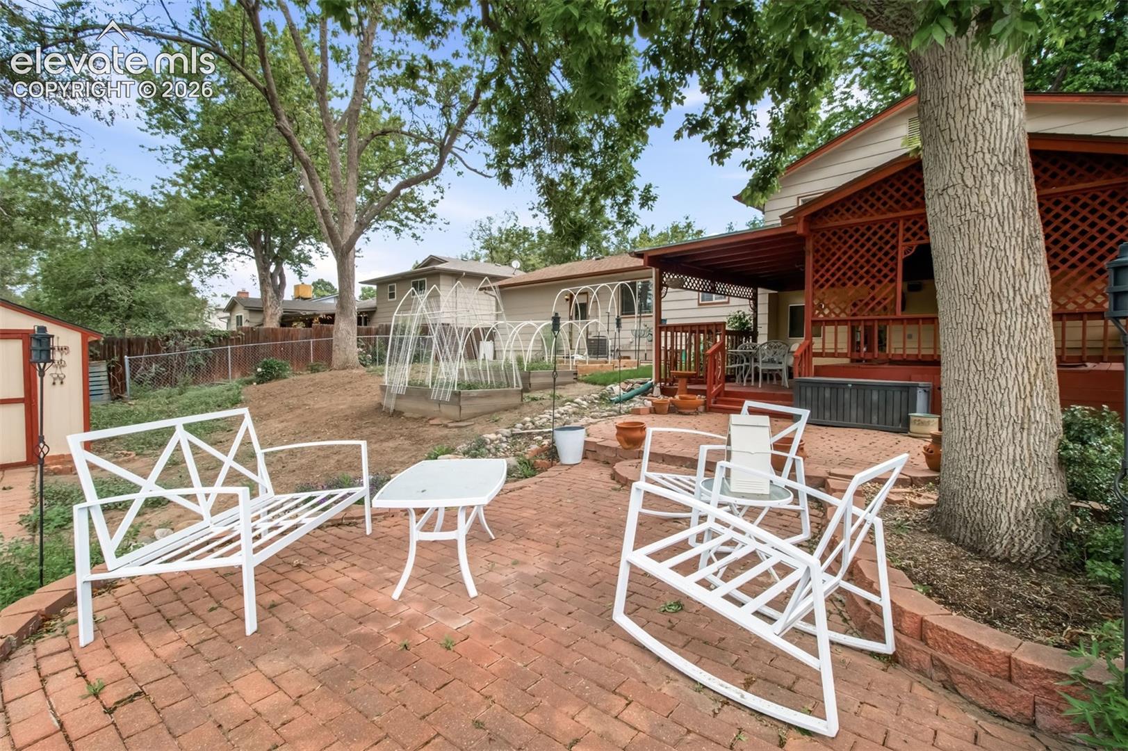1250 Osgood Road Colorado Springs, CO 80915 - Photo 3 of 30 Fully Fenced Backyard, Private Patio, Planter Boxes