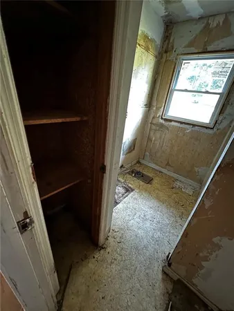 a bathroom with a sink toilet and mirror