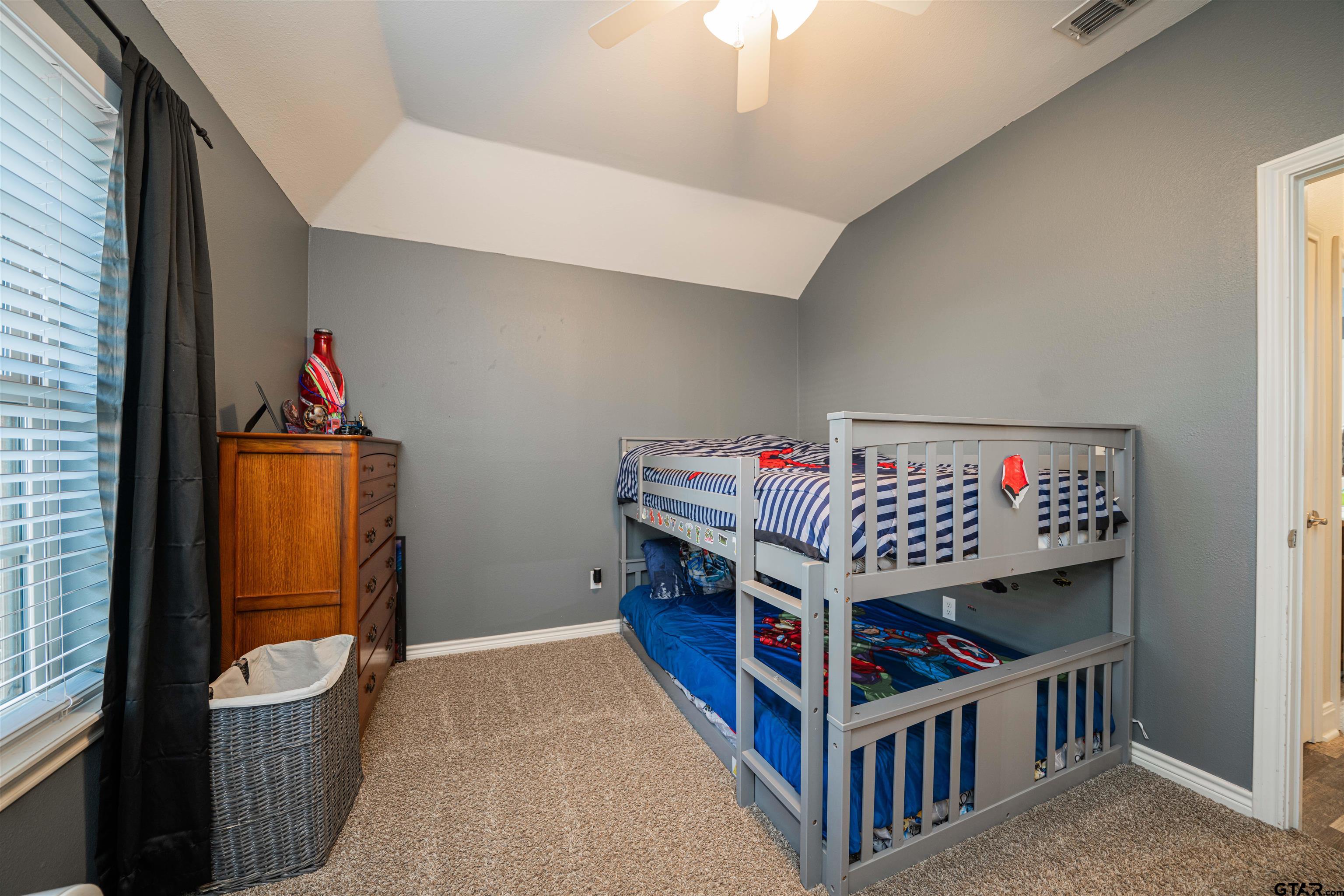 1001 Millstone Lane Chandler, TX 75758 - Photo 17 of 30 a room with furniture and storage