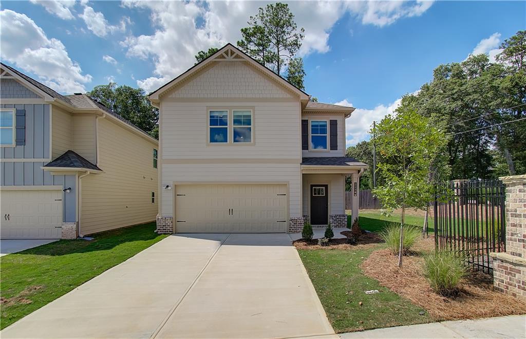 11635 Brightside Parkway Hampton, GA 30228 - Photo 1 of 24 front view of a house with a yard