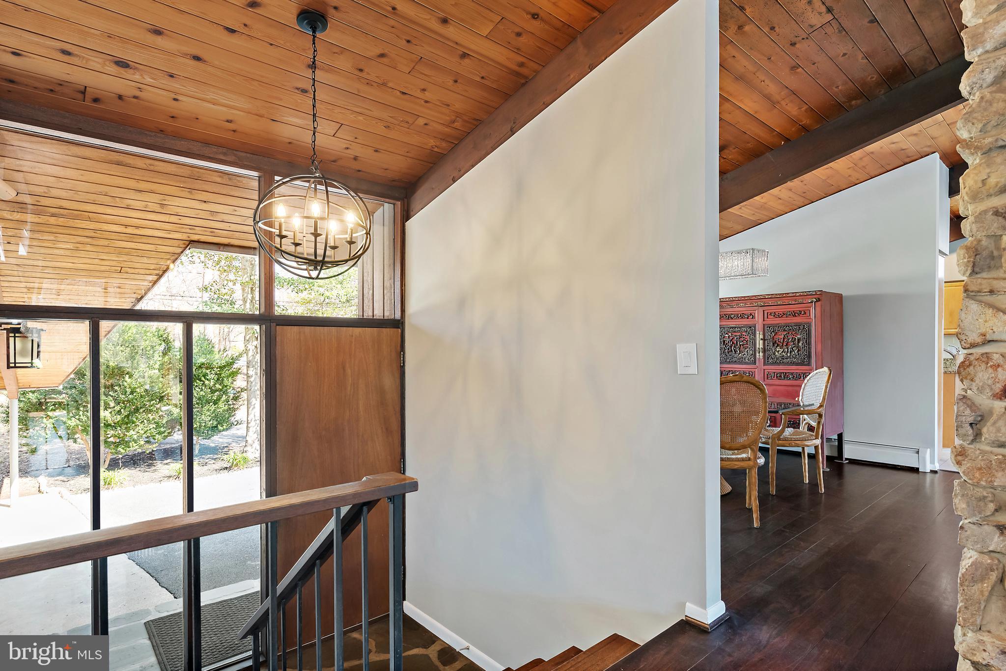 519 Epping Forest Road Annapolis, MD 21401 - Photo 24 of 73 a view of a dining room with furniture wooden floor and chandelier