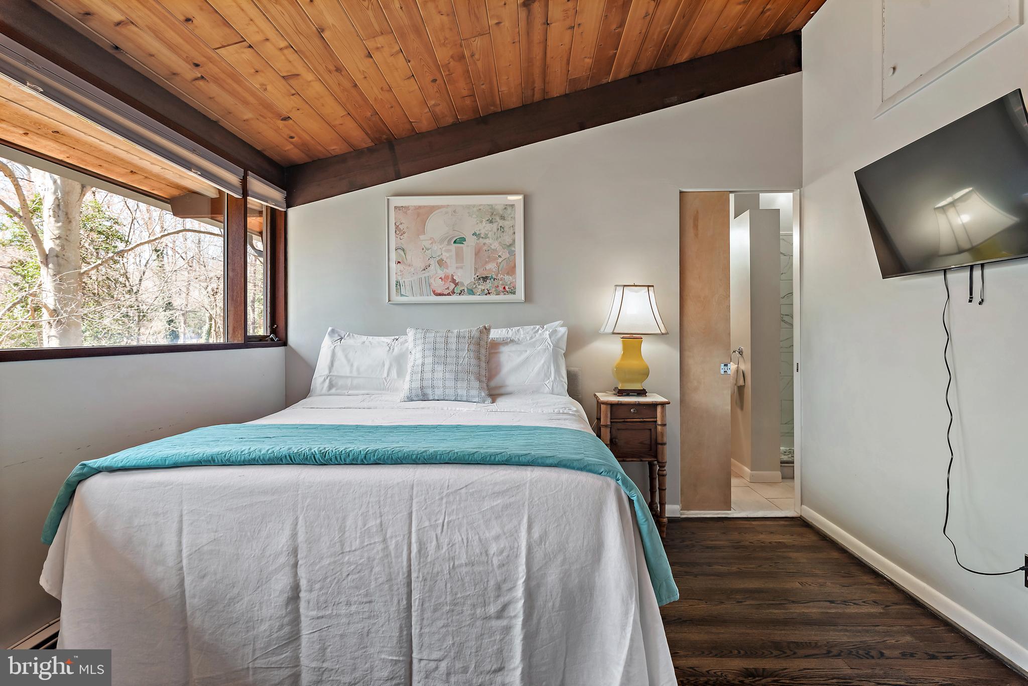 519 Epping Forest Road Annapolis, MD 21401 - Photo 39 of 73 a bedroom with a bed and a flat screen tv