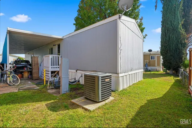 a view of a backyard with a patio