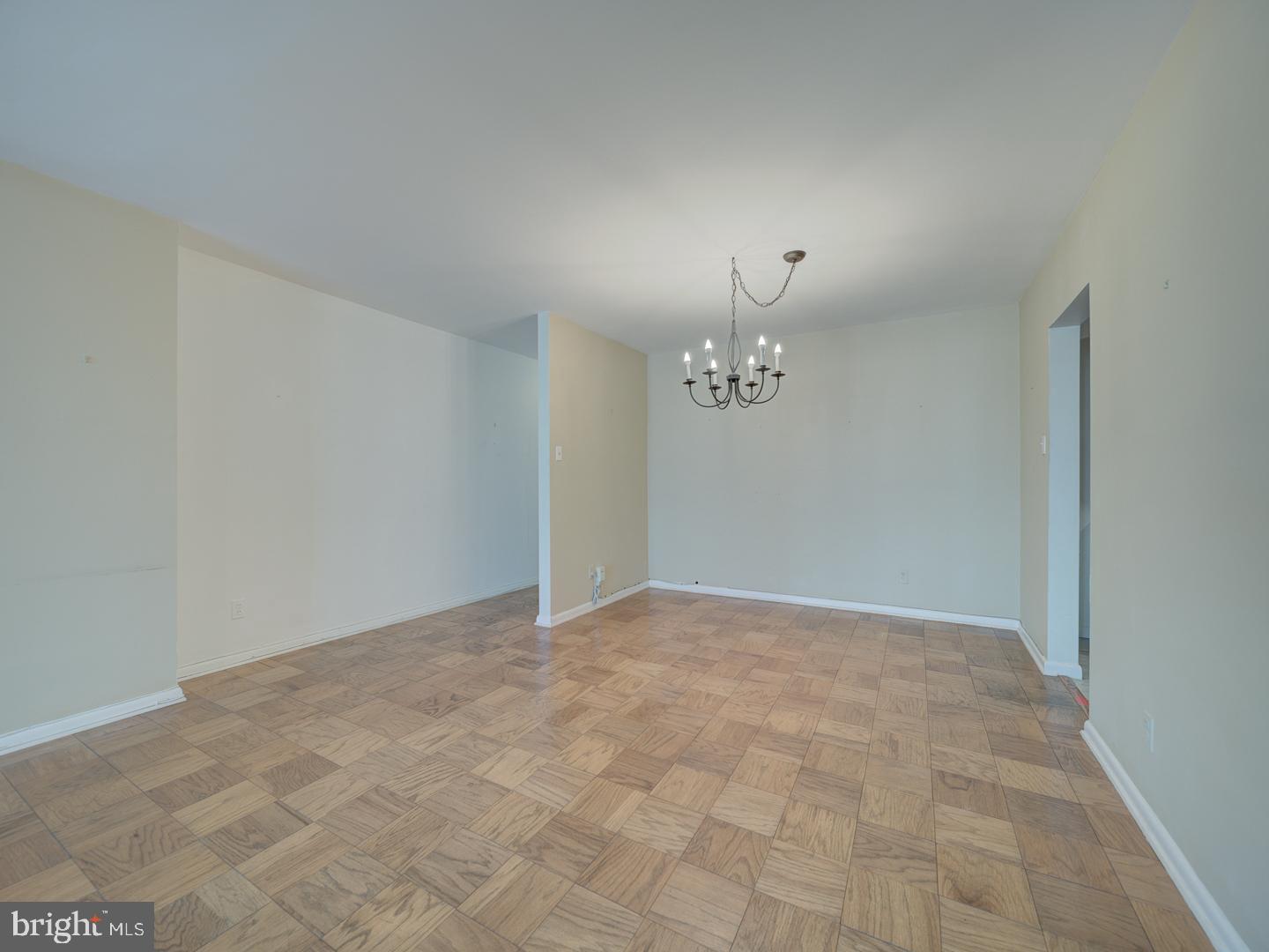 5101 River Road, Unit 411 Bethesda, MD 20816 - Photo 12 of 26 a view of an empty room with a window