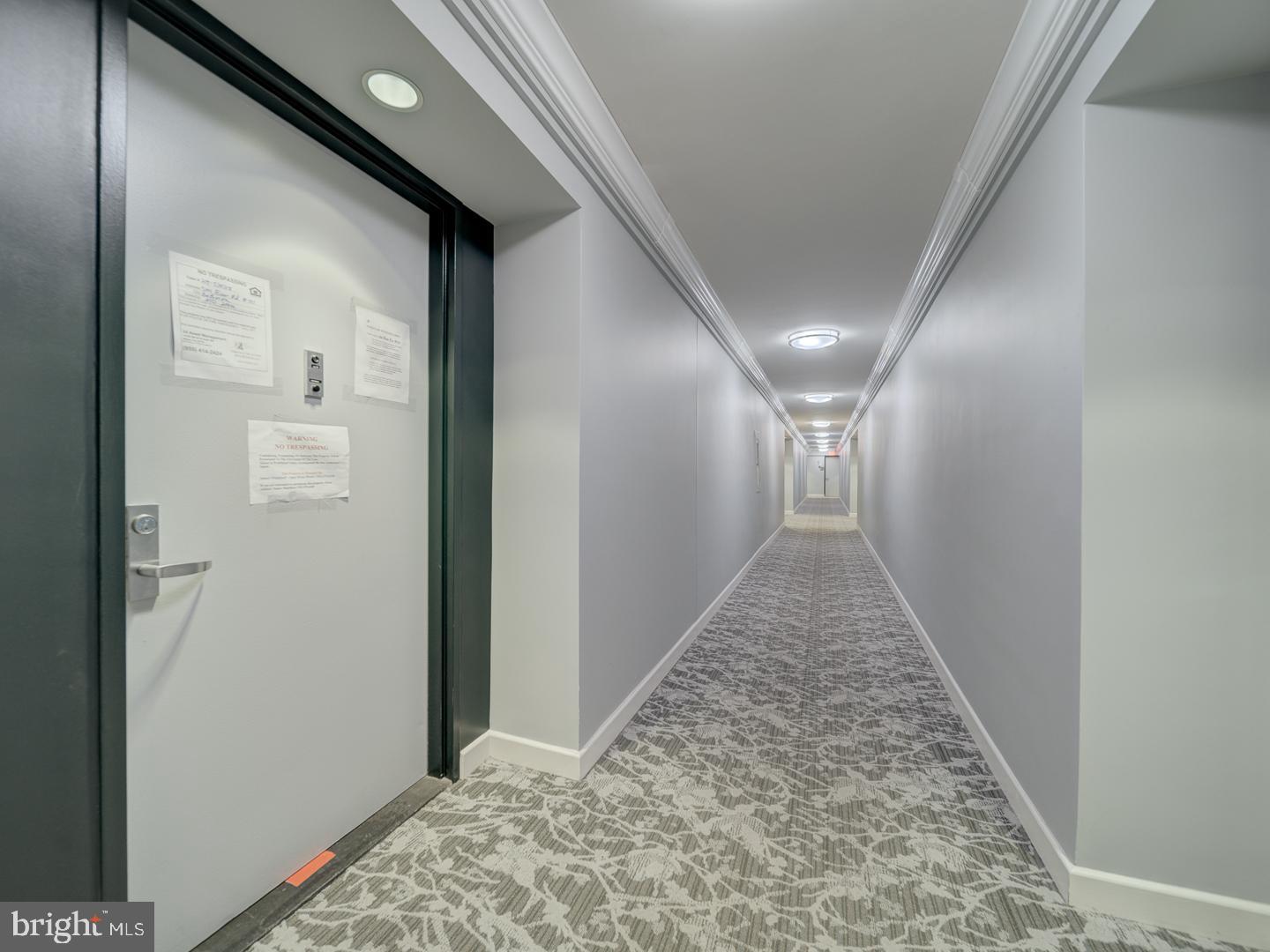 5101 River Road, Unit 411 Bethesda, MD 20816 - Photo 4 of 26 a view of a hallway