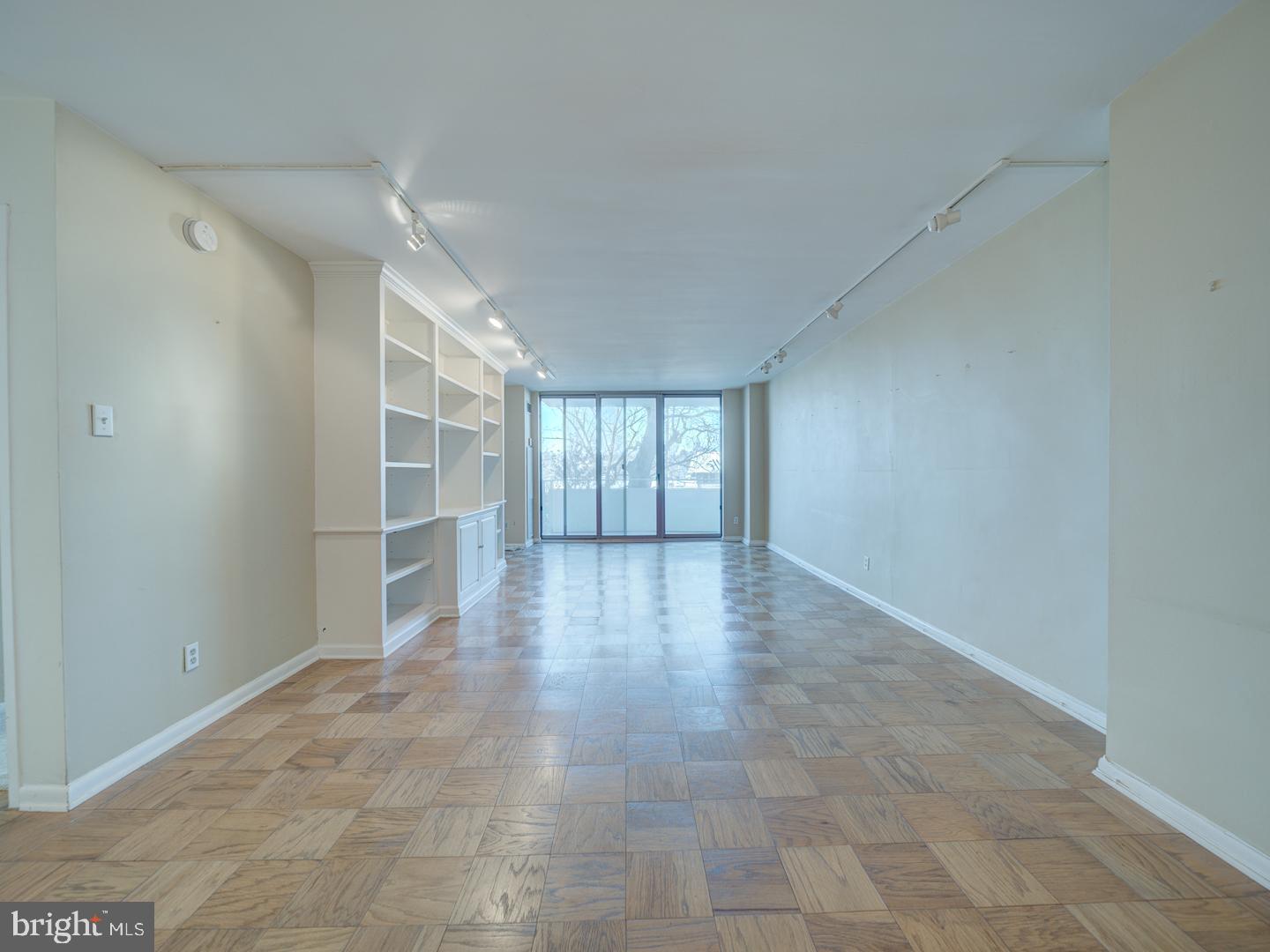5101 River Road, Unit 411 Bethesda, MD 20816 - Photo 9 of 26 a view of an empty room with a window
