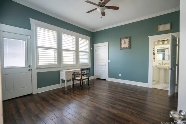 a view of a livingroom with furniture and a window