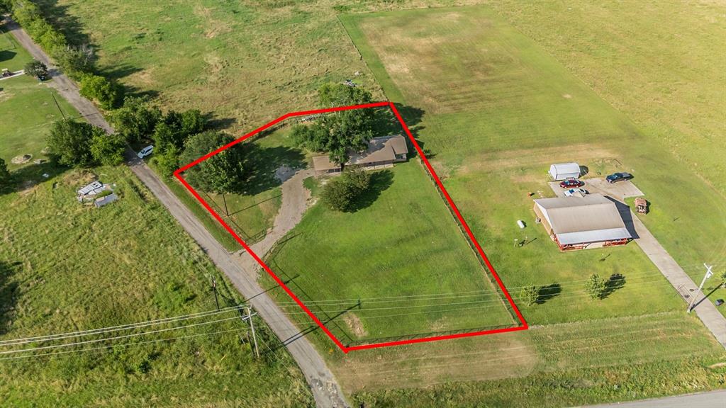 View of rural area featuring property parcel outlined and agricultural land