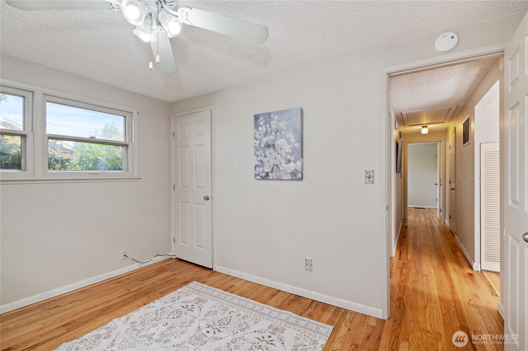 944 East 30th Street Bremerton, WA 98310 - Photo 15 of 21 wooden floor in an empty room with a window
