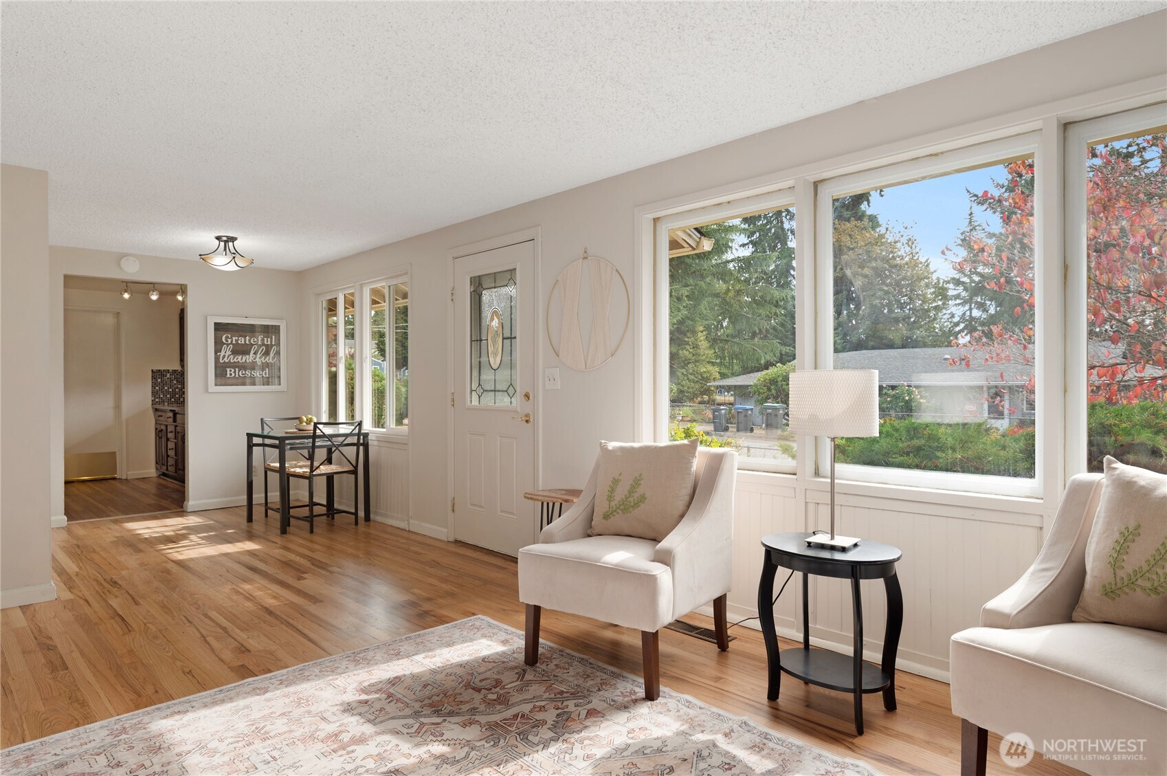 944 East 30th Street Bremerton, WA 98310 - Photo 4 of 21 a living room with furniture and large windows