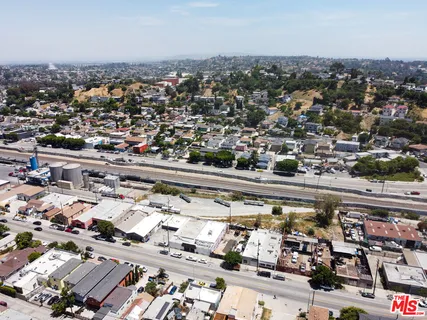 a black and white photo of a refrigerator