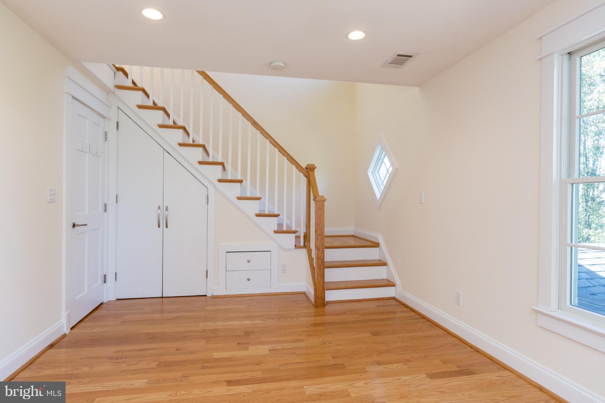 4926 43rd Place Northwest Washington, DC 20016 - Photo 16 of 23 a view of entryway and hall with wooden floor