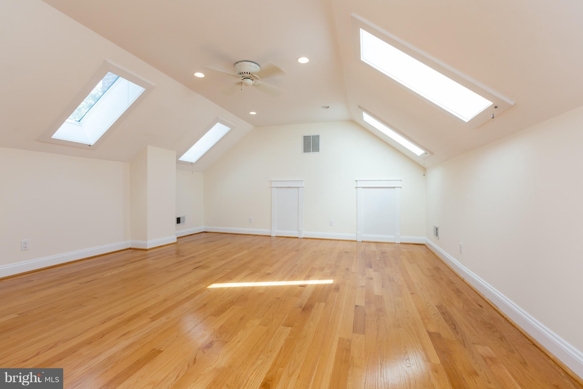 4926 43rd Place Northwest Washington, DC 20016 - Photo 17 of 23 a view of empty room with wooden floor