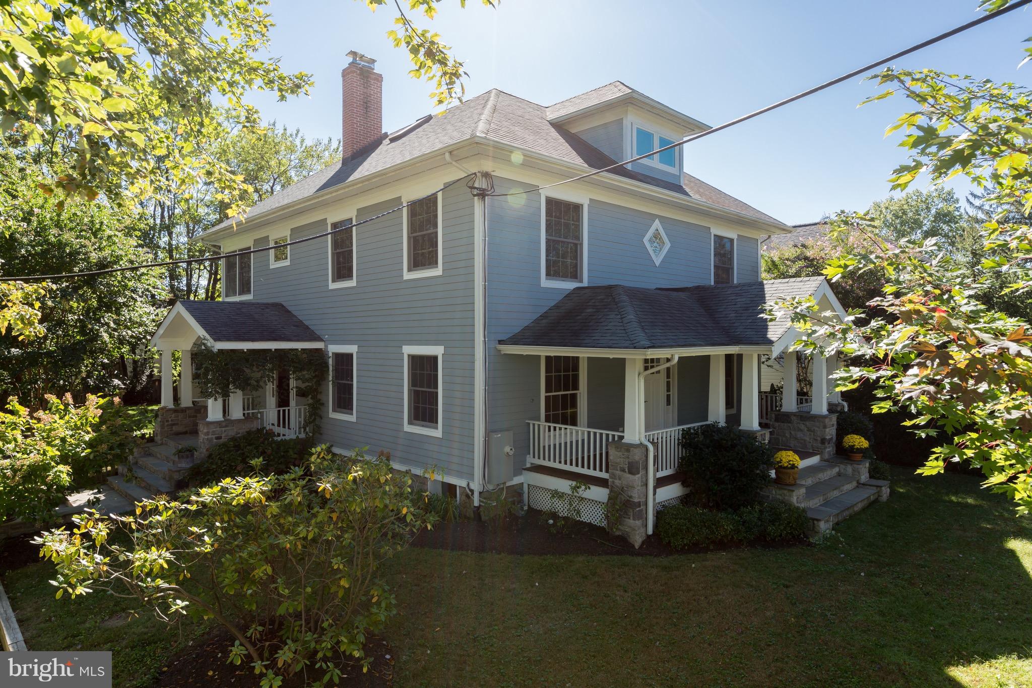 4926 43rd Place Northwest Washington, DC 20016 - Photo 22 of 23 front view of a house with a garden