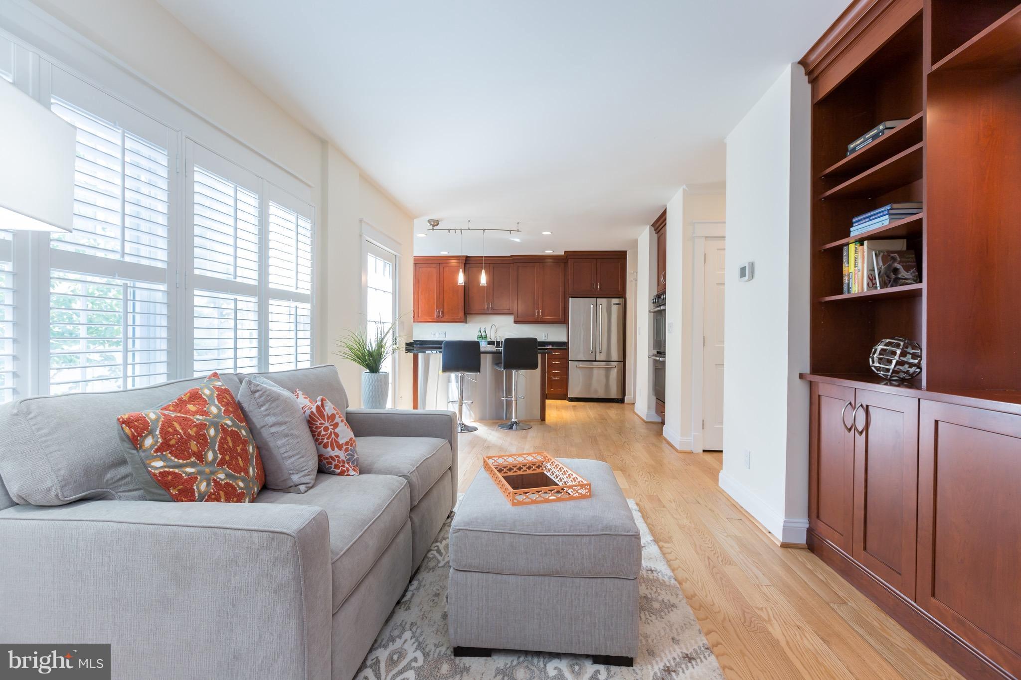 4926 43rd Place Northwest Washington, DC 20016 - Photo 6 of 23 a living room with furniture and a large window