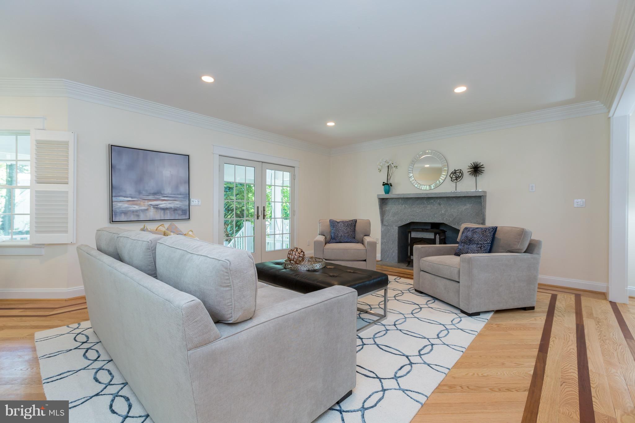 4926 43rd Place Northwest Washington, DC 20016 - Photo 7 of 23 a living room with furniture and a fireplace