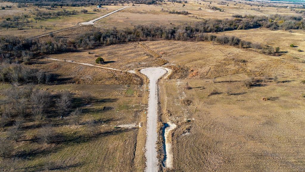 Tbd Tbd Ranchside Itasca, TX 76055 - Photo 4 of 12 a view of a backyard of a house