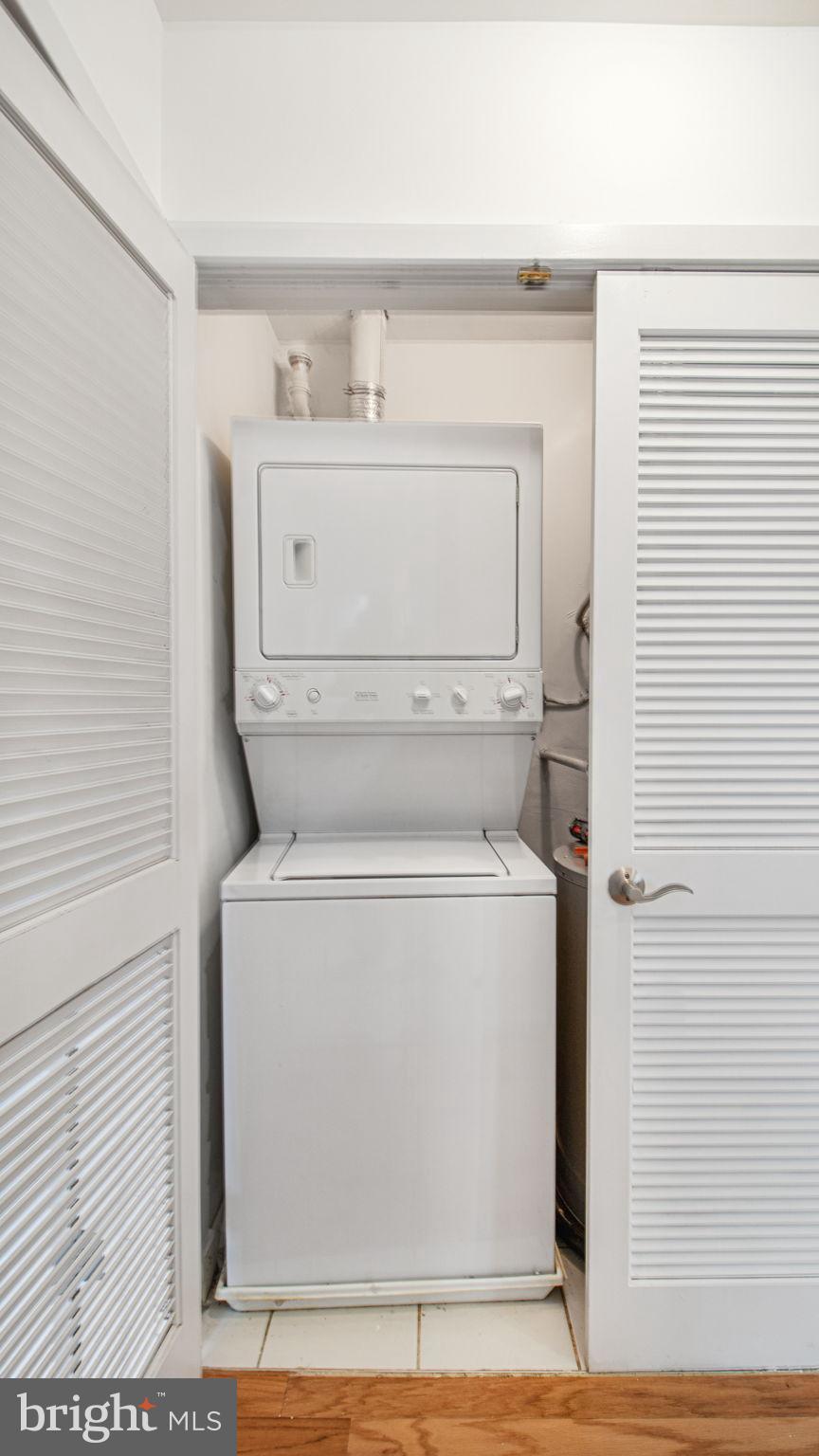 1501 27th Street Southeast, Unit 406 Washington, DC 20020 - Photo 15 of 44 a utility room with dryer and washer