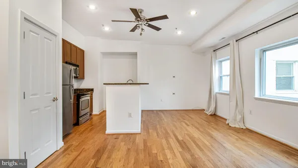 a view of an empty room with a window