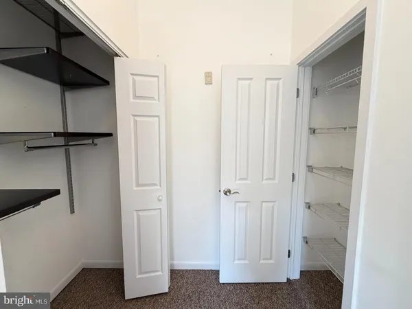 a view of a room with racks on the wall