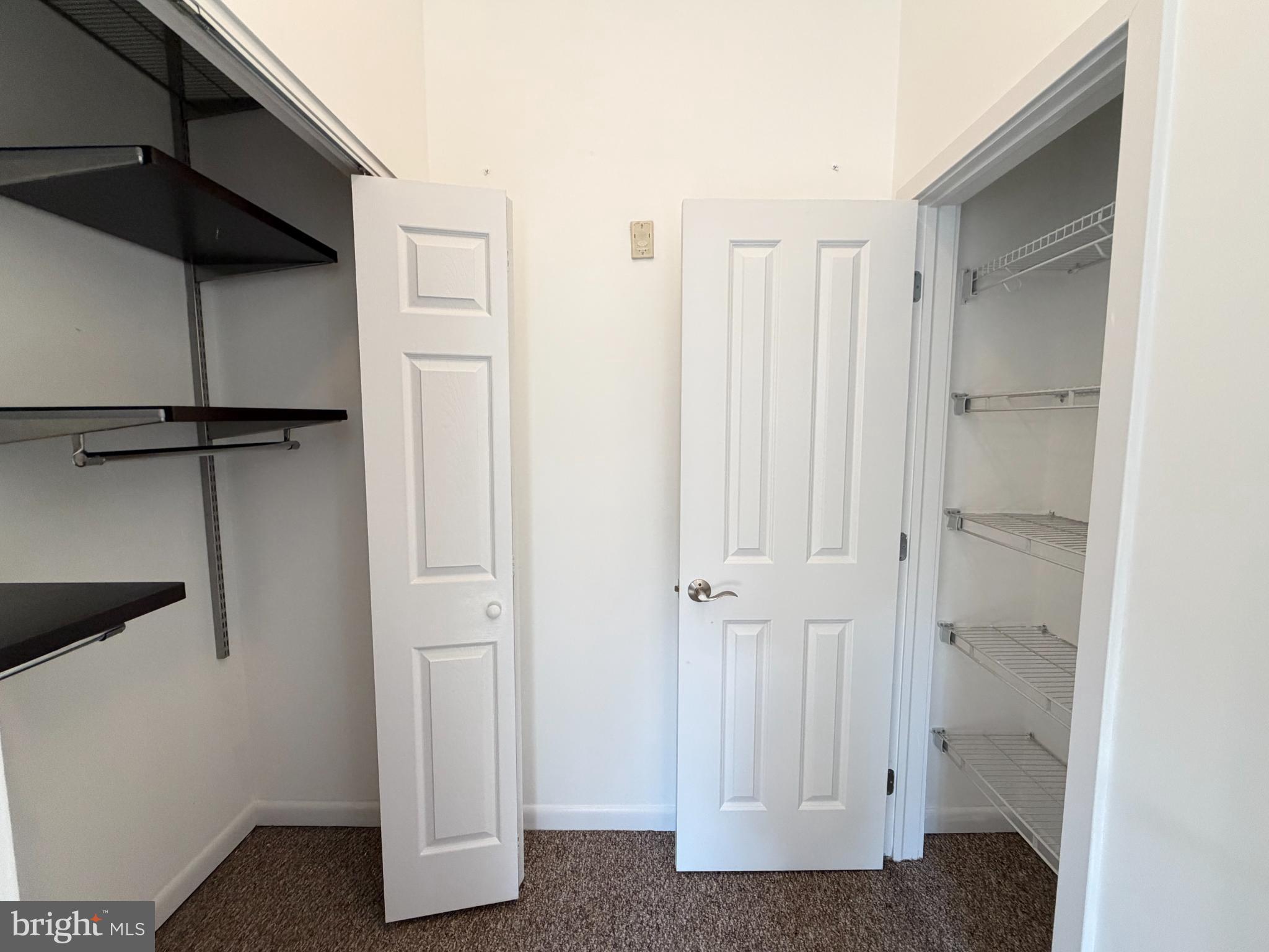 1501 27th Street Southeast, Unit 406 Washington, DC 20020 - Photo 23 of 44 a view of walk in closet