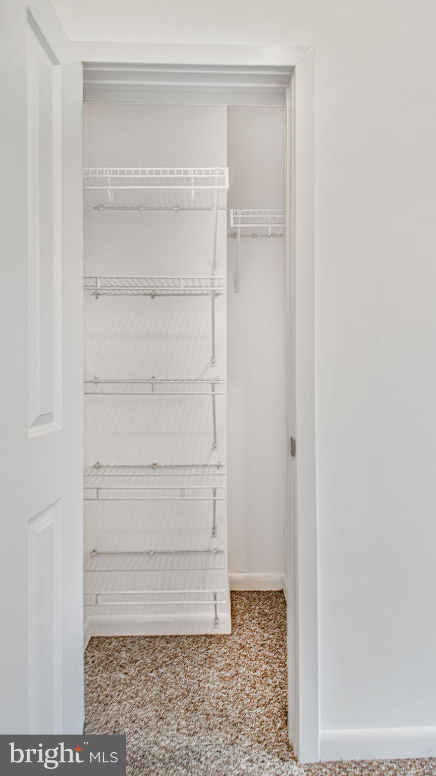 1501 27th Street Southeast, Unit 406 Washington, DC 20020 - Photo 24 of 44 a view of walk in closet