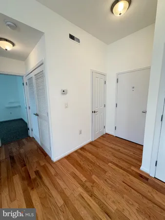 a kitchen with stainless steel appliances granite countertop a stove a refrigerator and a microwave