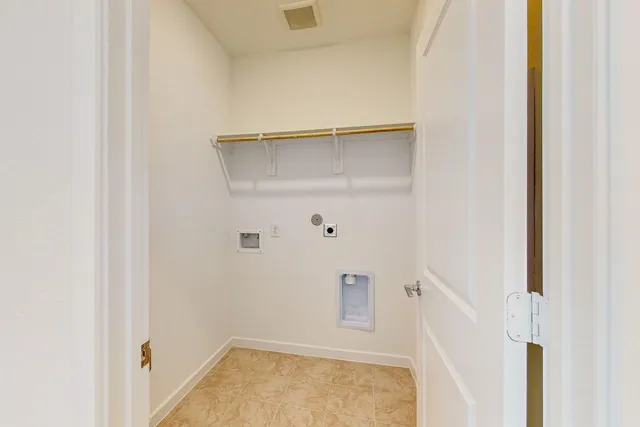 a view of small space with racks on the wall