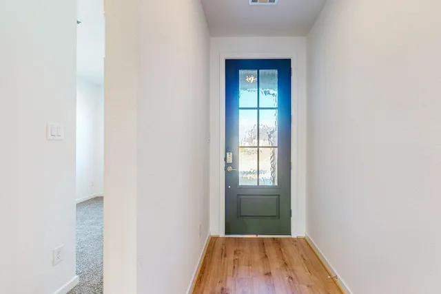 a view of a room that has a window