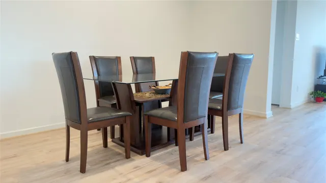 a view of a dining room with furniture