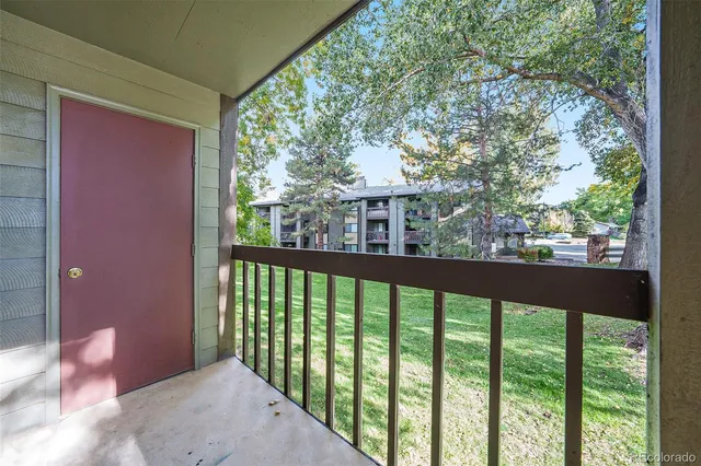 a view of a balcony with an outdoor space