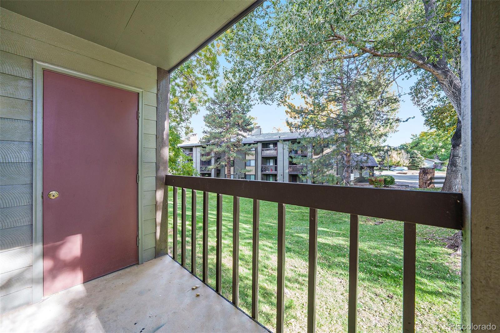 925 Columbia Road, Unit 726 Fort Collins, CO 80525 - Photo 11 of 14 a view of a balcony with an outdoor space