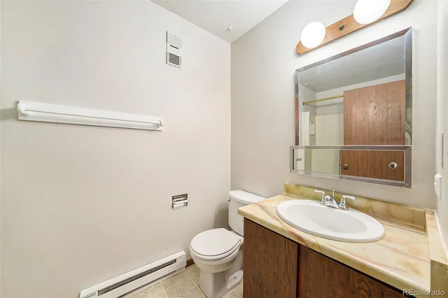 a bathroom with a sink and a toilet