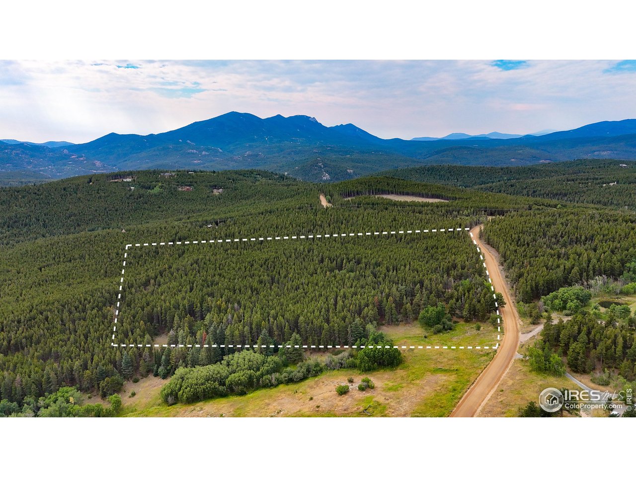 0 Magnolia Road Nederland, CO 80466 - Photo 1 of 14 From Magnolia Dr. Bottom of photo is near east corner of lots. Lot lines are VERY approximate. Lot extends 1663 feet from Magnolia to rear of lots, in a rectangular shape.