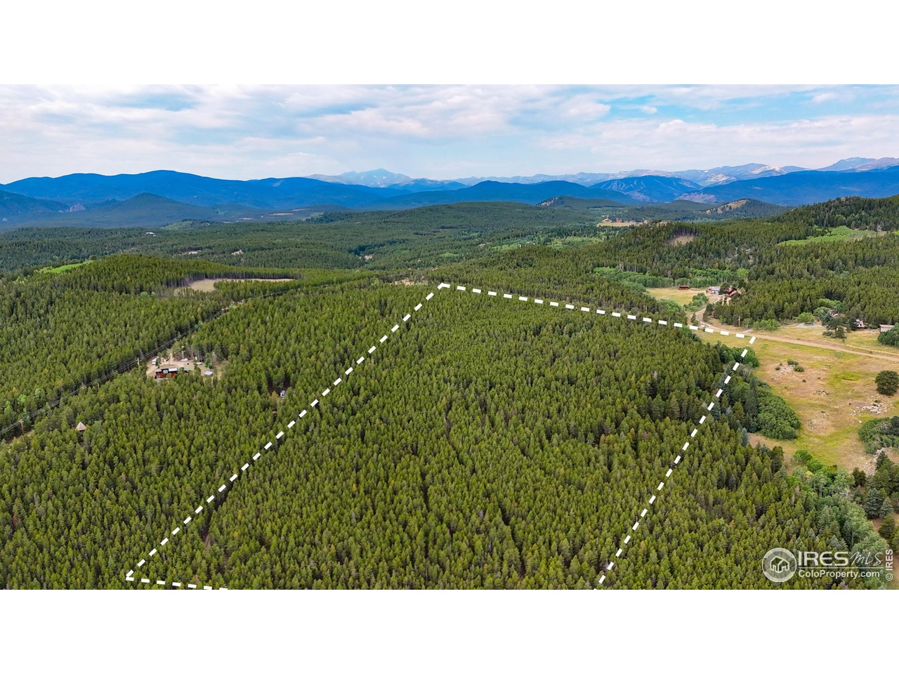 0 Magnolia Road Nederland, CO 80466 - Photo 14 of 14 Higher perspective. Corner of Magnolia and Lazy Z shown at left of center. Powerline is off of Lazy Z, visible on left. Lot lines are VERY approximate. Lot extends 1663 feet from Magnolia to rear of lots, in a rectangular shape.