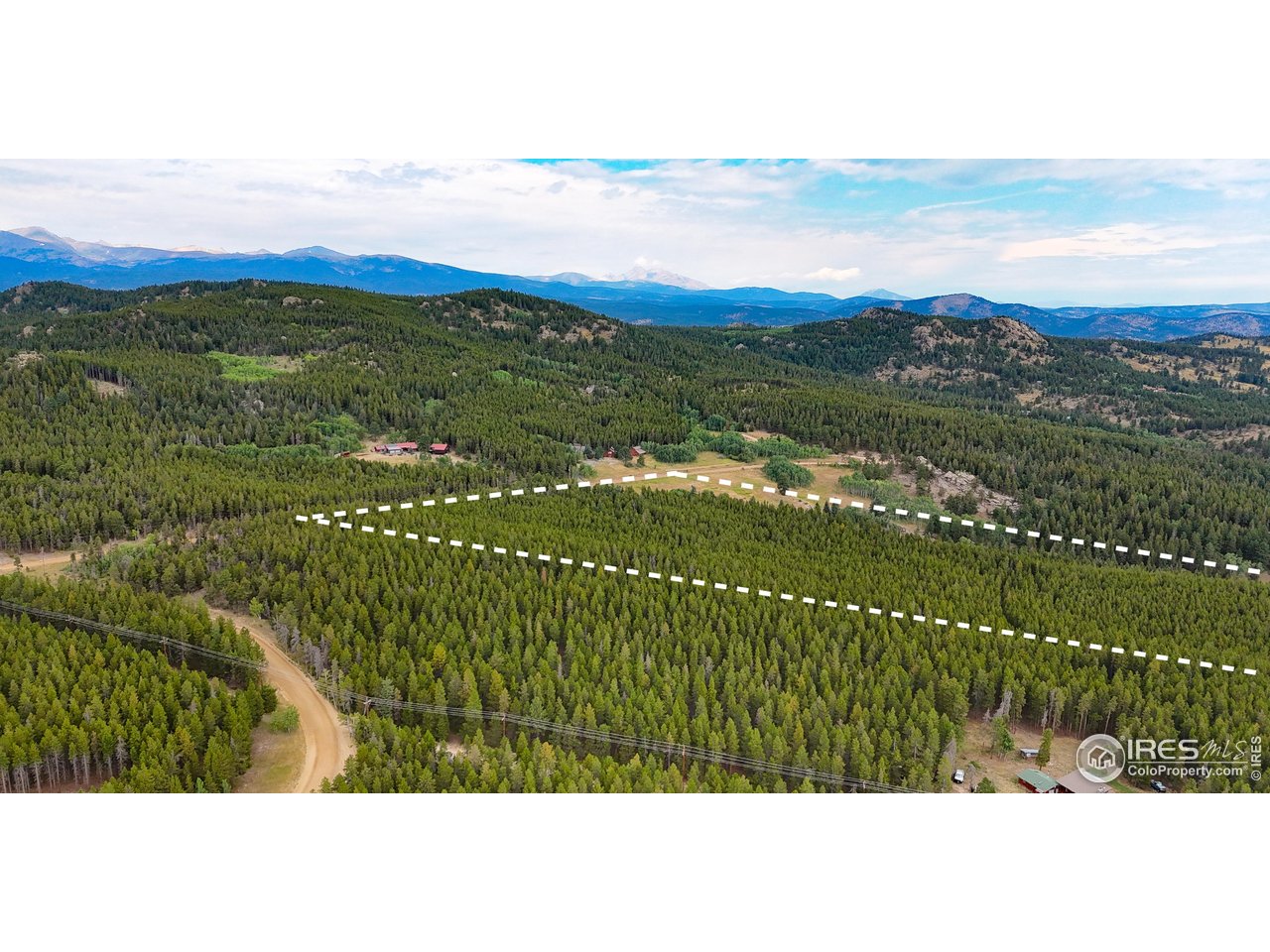 0 Magnolia Road Nederland, CO 80466 - Photo 4 of 14 Corner of Magnolia and Lazy Z. Powerline is off of Lazy Z, visible on left.Lot lines are VERY approximate. Lot extends 1663 feet from Magnolia to rear of lots, in a rectangular shape.